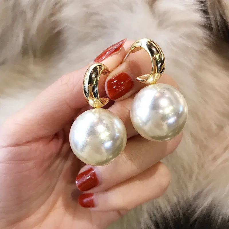 Brinco Argola Dourado com Bola de Perola 2