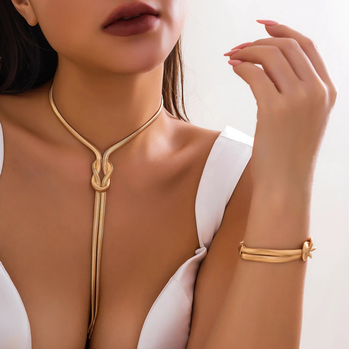Conjunto Colar e Pulseira Nó Feminina