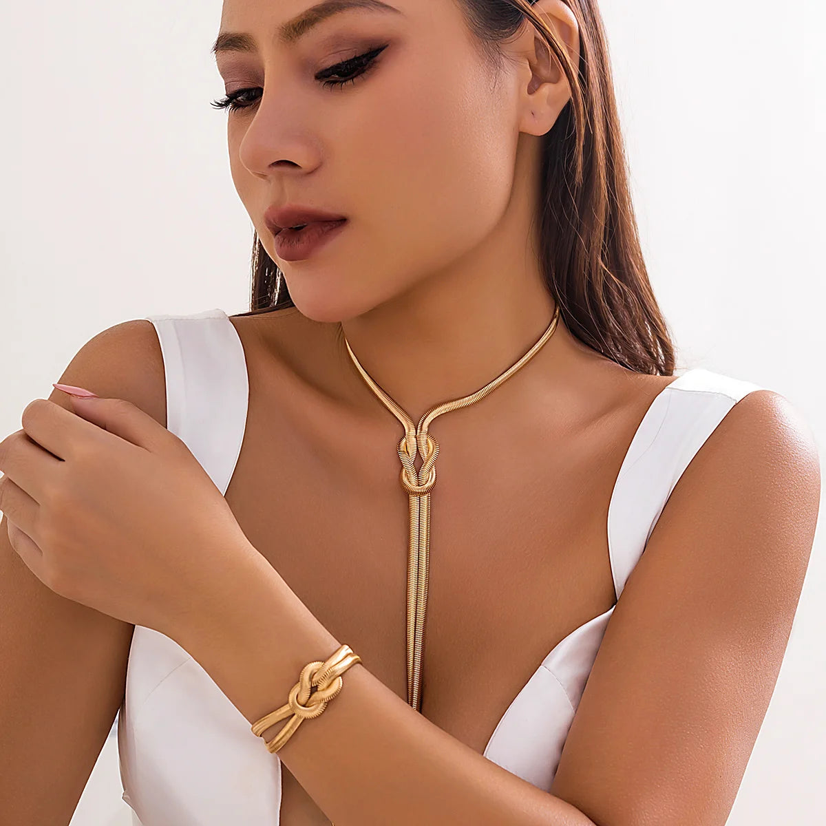 Conjunto Colar e Pulseira Nó Feminina