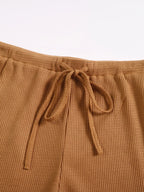 Calça pantalona feminina de tricot com cintura elástica