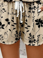 Conjunto floral feminino bege vista traseira