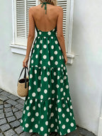 Detalhe do vestido verde com estampa de poá