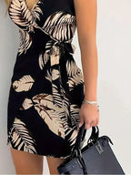 Vestido feminino estampado com detalhe de amarração frontal