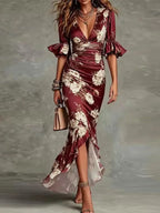 Vestido longo floral com decote V e detalhes em 