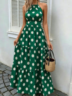 Vestido verde poá com caimento fluido